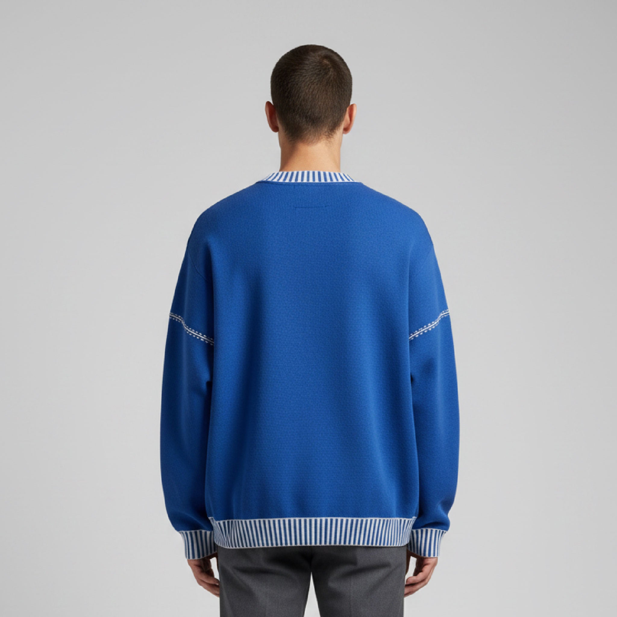 a blue sweatshirt with Al-Nassr details on it