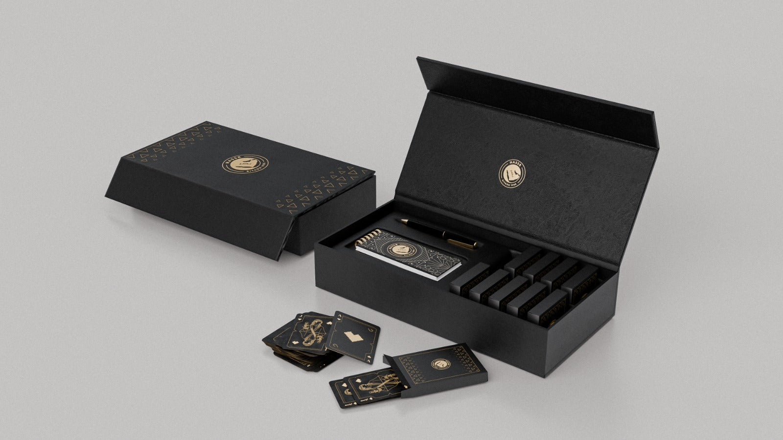 Al Nassr FC Baloot luxury gift box closed and open — side angle showing card deck inside premium matte black packaging
