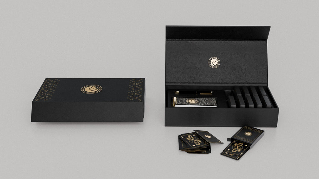 Al Nassr FC Baloot luxury deck open gift box showing multiple card decks and magnetic closure — top view