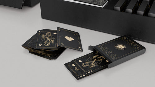 Al Nassr FC Baloot deck of cards fanned out showing black matte finish with gold foil court card art