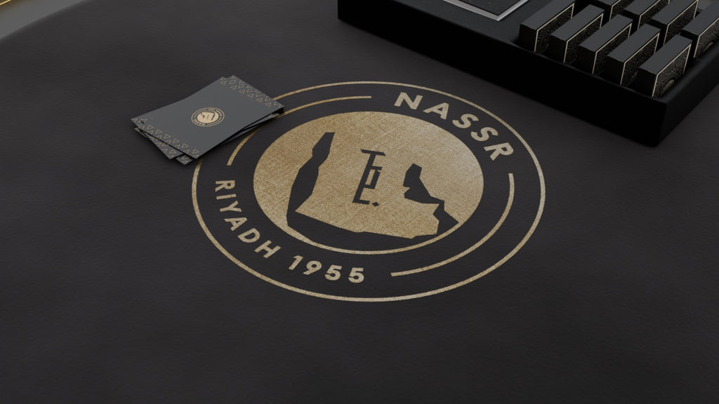 Al Nassr FC Baloot Table — angled side view showing pedestal base, gold trim ring, and pull-out tray