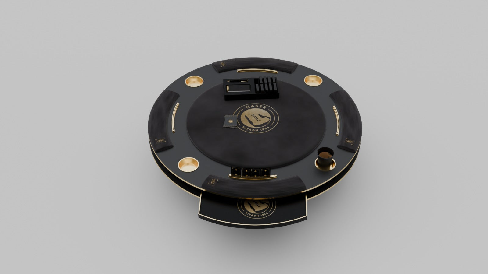 Al Nassr FC Baloot Table surface close-up — Nassr Riyadh 1955 gold crest on matte black felt with card deck and shuffler