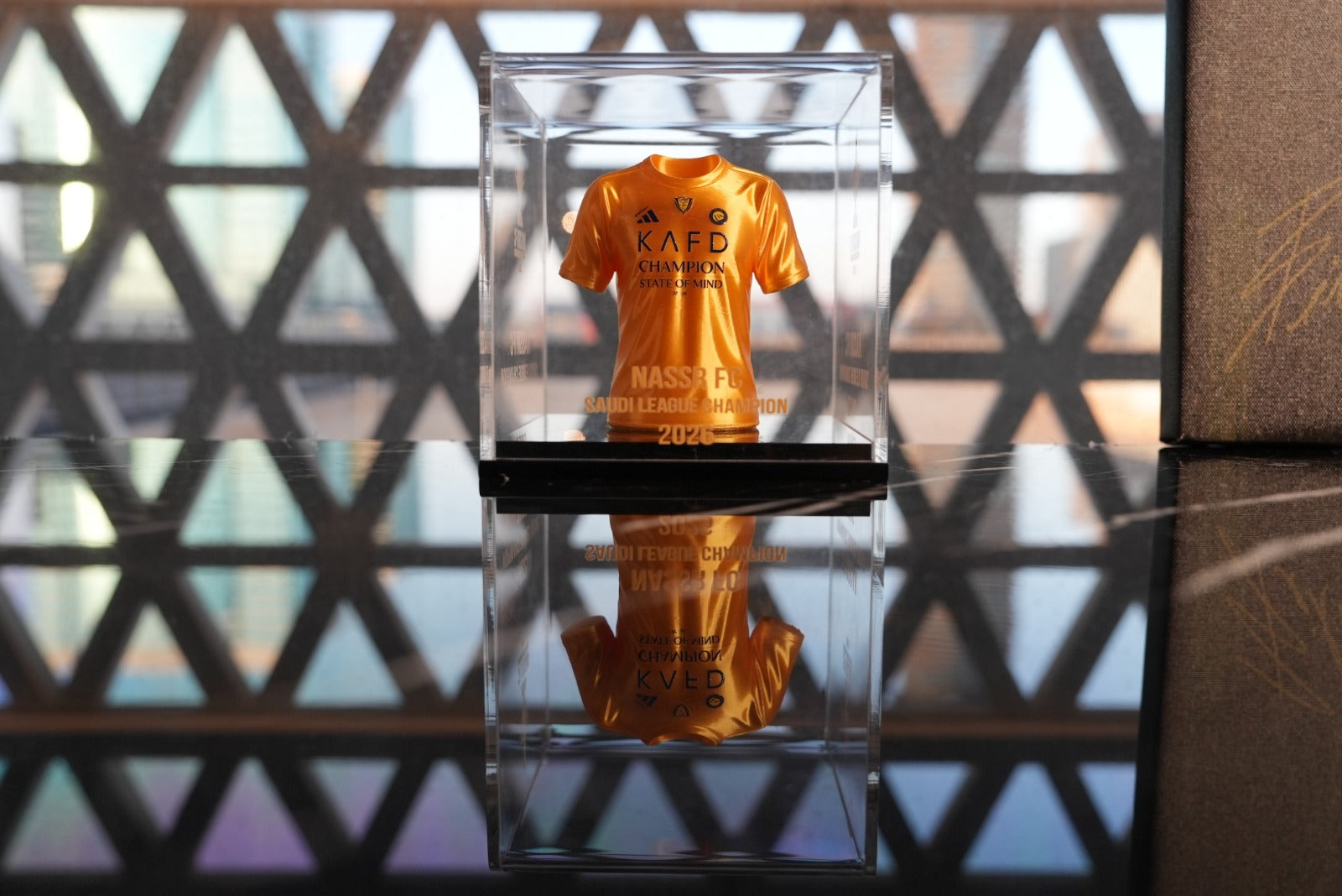 Al Nassr FC Saudi League Champion 2026 mini jersey display case — side angle with engraving detail
