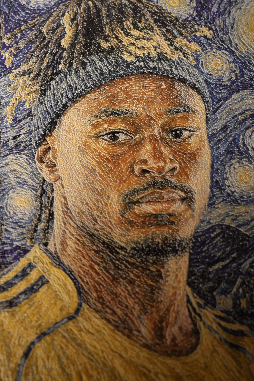 Al Nassr FC hand-embroidered Starry Night artwork — close-up portrait of player in golden kit